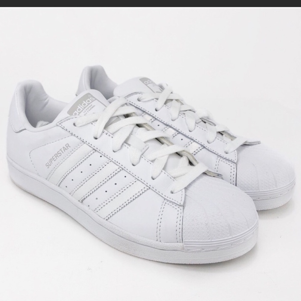 All white adidas superstars